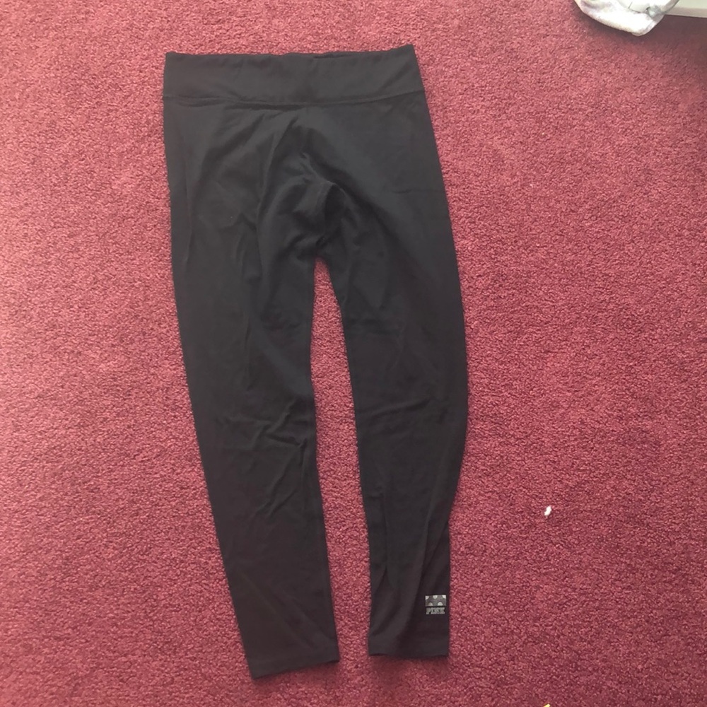 Large VS. Pink leggings.